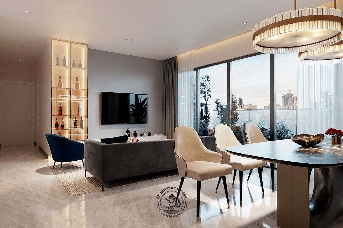 Phương án sắp xếp sofa tạo khoảng mở kết nối trực tiếp với khu vực bàn ăn, sử dụng hệ đèn thả trần nghệ thuật để phân định công năng trần