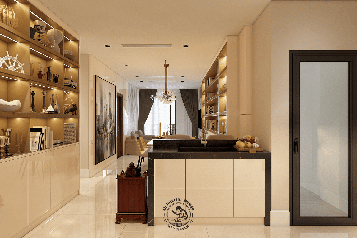 Góc nhìn từ phân khu bếp nấu hướng ngược lại lối hành lang, làm rõ vị trí của hệ đảo bếp phụ mặt đá màu đen trang bị chậu rửa đơn