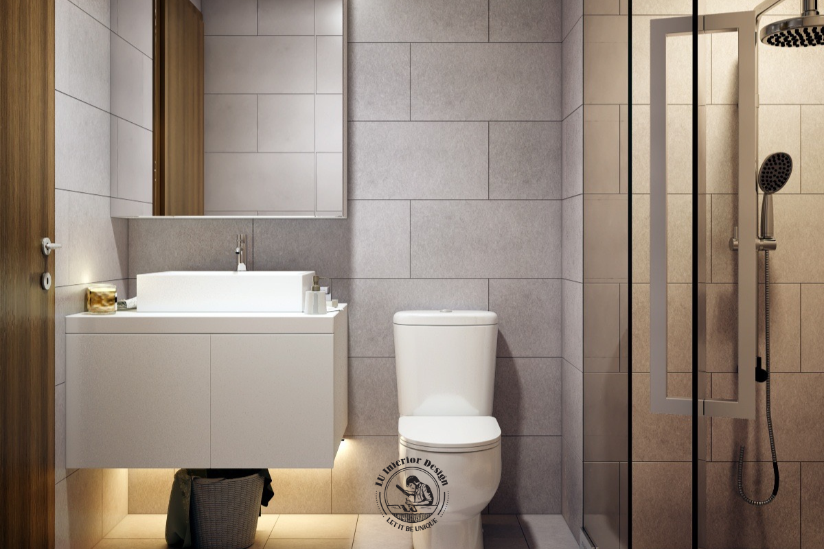 Không gian phòng tắm nổi bật với sự đồng bộ của thiết bị vệ sinh cao cấp, gương soi lớn và hệ thống ánh sáng vàng ấm áp, tạo cảm giác thư giãn tuyệt đối