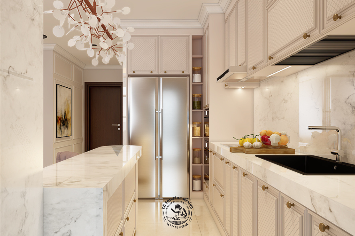 Hệ tủ bếp chữ I kết hợp đảo bếp mặt đá marble trắng vân mây, bố trí đồng bộ với tủ lạnh hai cánh âm tường gọn gàng