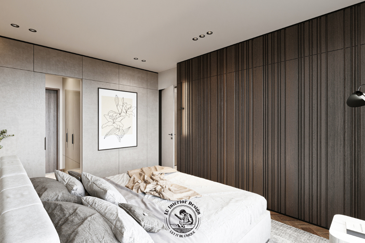 Góc nhìn bao quát từ đầu giường làm nổi bật sự kết hợp hài hòa giữa sàn gỗ xương cá và vách tường phẳng