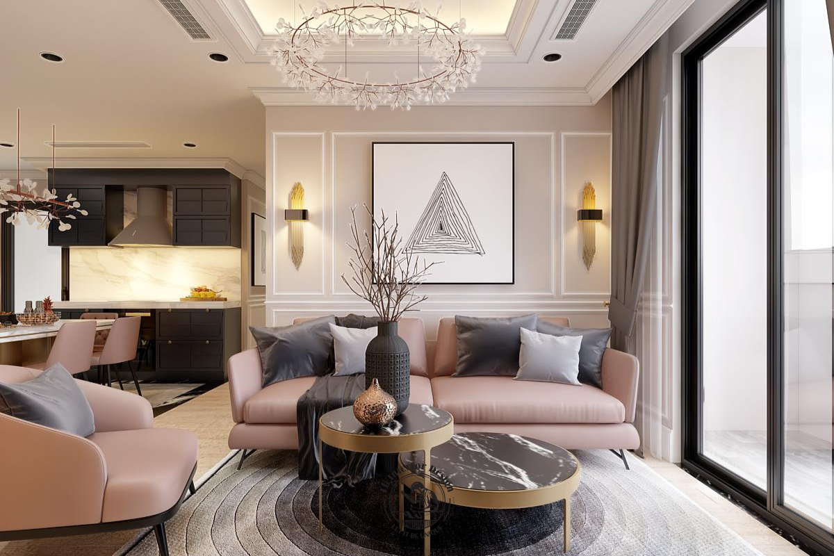 Không gian đón khách sang trọng với sofa hồng pastel, vách phào chỉ tinh tế và đèn chùm thiết kế hiện đại