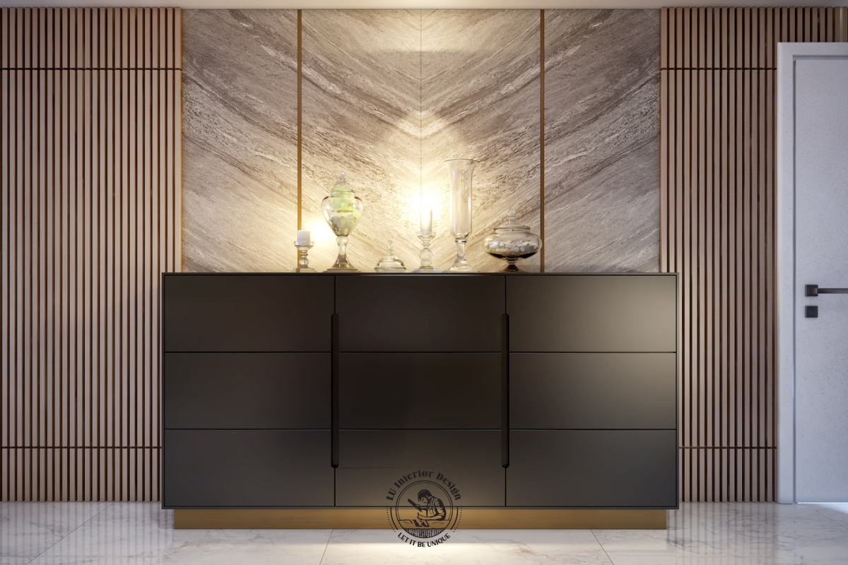 Tủ console màu đen mờ chân kim loại vàng đặt trên nền vách đá kết hợp ốp nan gỗ hai bên đối xứng