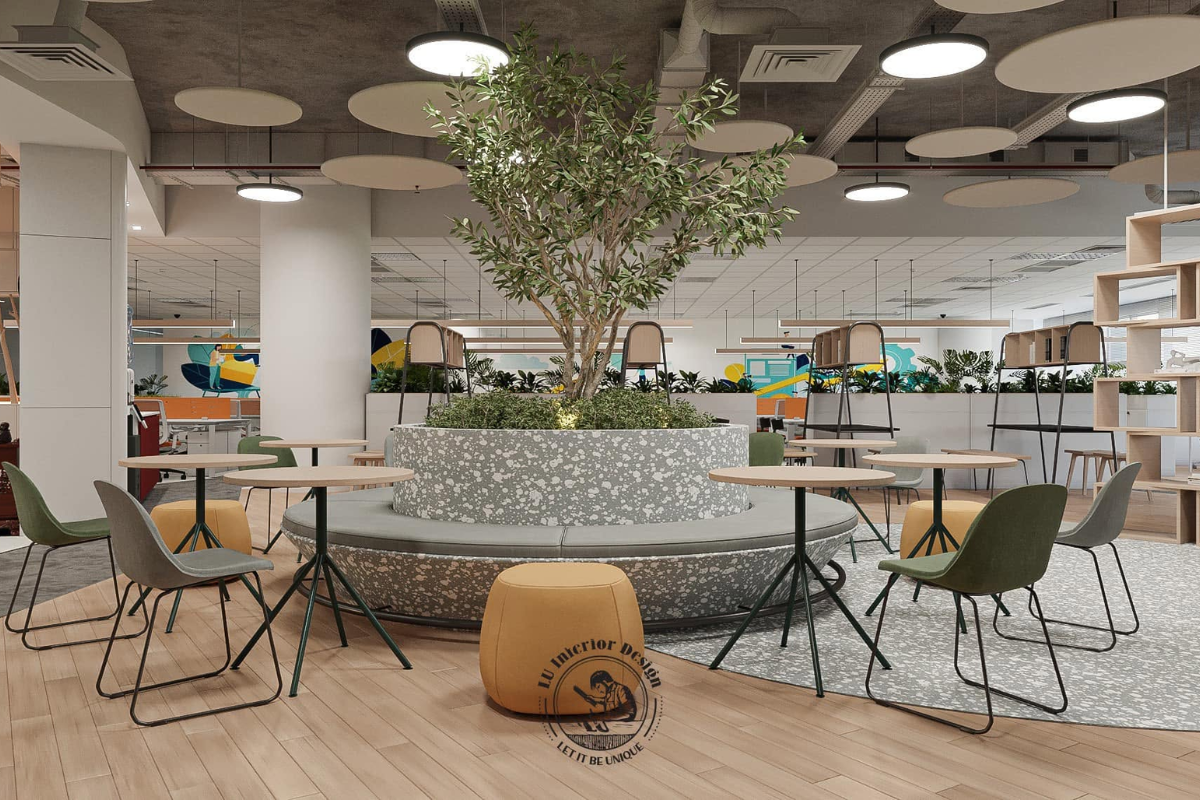 Khu vực thảo luận mở và pantry được bố trí cụm cây xanh trung tâm, mang lại năng lượng tích cực và cảm hứng sáng tạo cho nhân sự