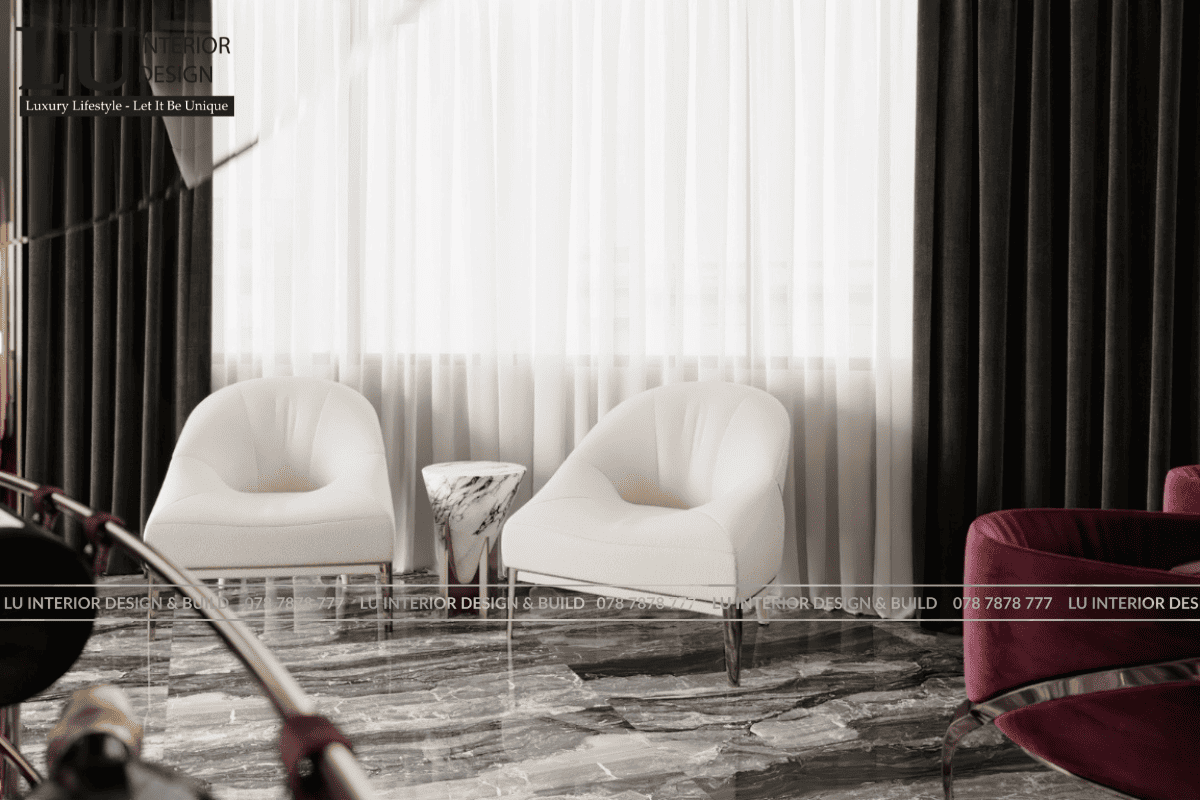 Thiết kế góc thư giãn penthouse Vũng Tàu với ghế bành trắng