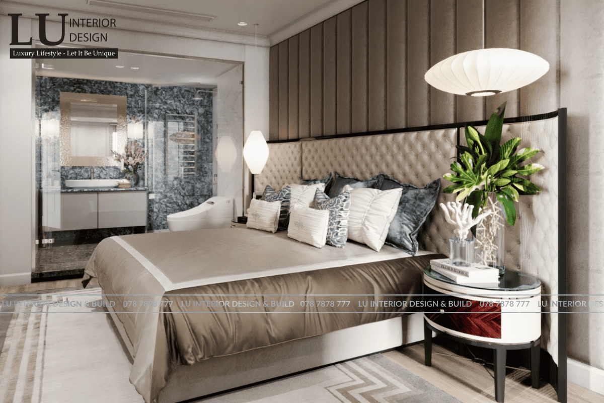 Thiết kế phòng ngủ master penthouse Vũng Tàu tone xanh thiết kế hiện đại cổ điển với vách đầu giường bọc nệm và phòng tắm liền kề