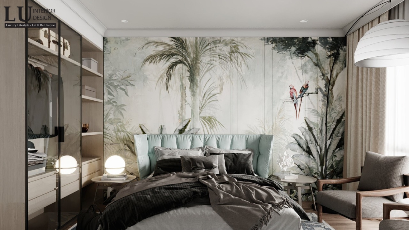 phòng ngủ tone xanh thiết kế modern classic penthouse Vũng Tàu với đầu giường bọc nệm và tranh tường tropical nghệ thuật