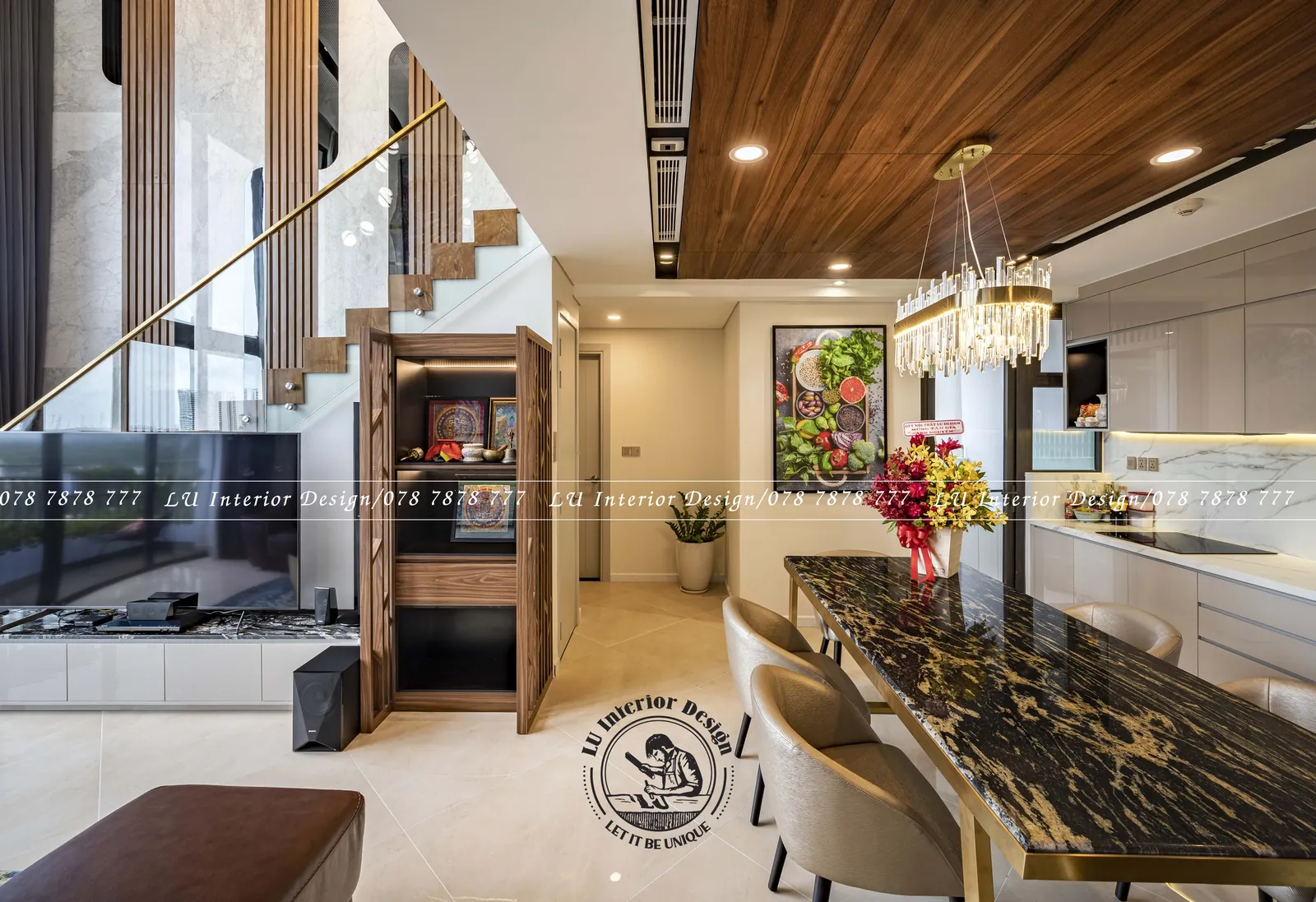 Phòng ăn nhìn về vách tivi và cầu thang – hình ảnh thực tế công trình căn hộ Duplex 3PN 148m² – LU Design