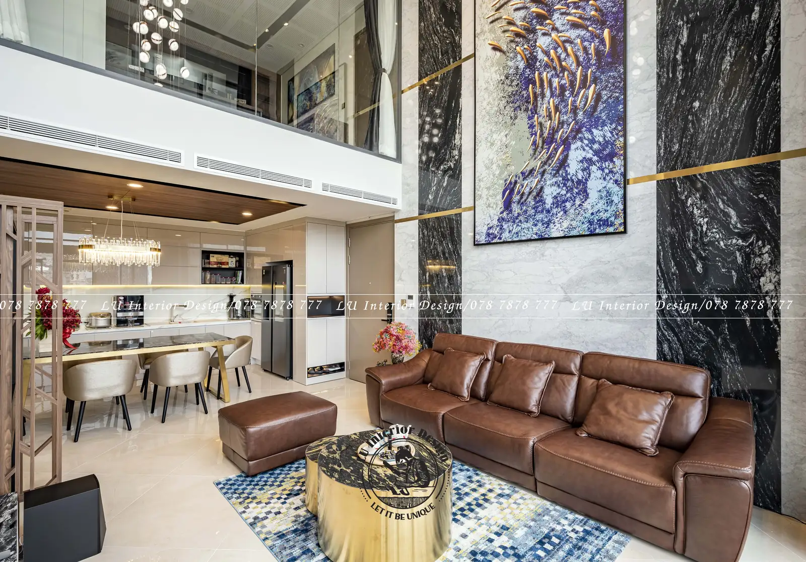 Phòng khách nhìn từ bếp về vách đá đen – hình ảnh thực tế công trình căn hộ Duplex 3PN 148m² – LU Design