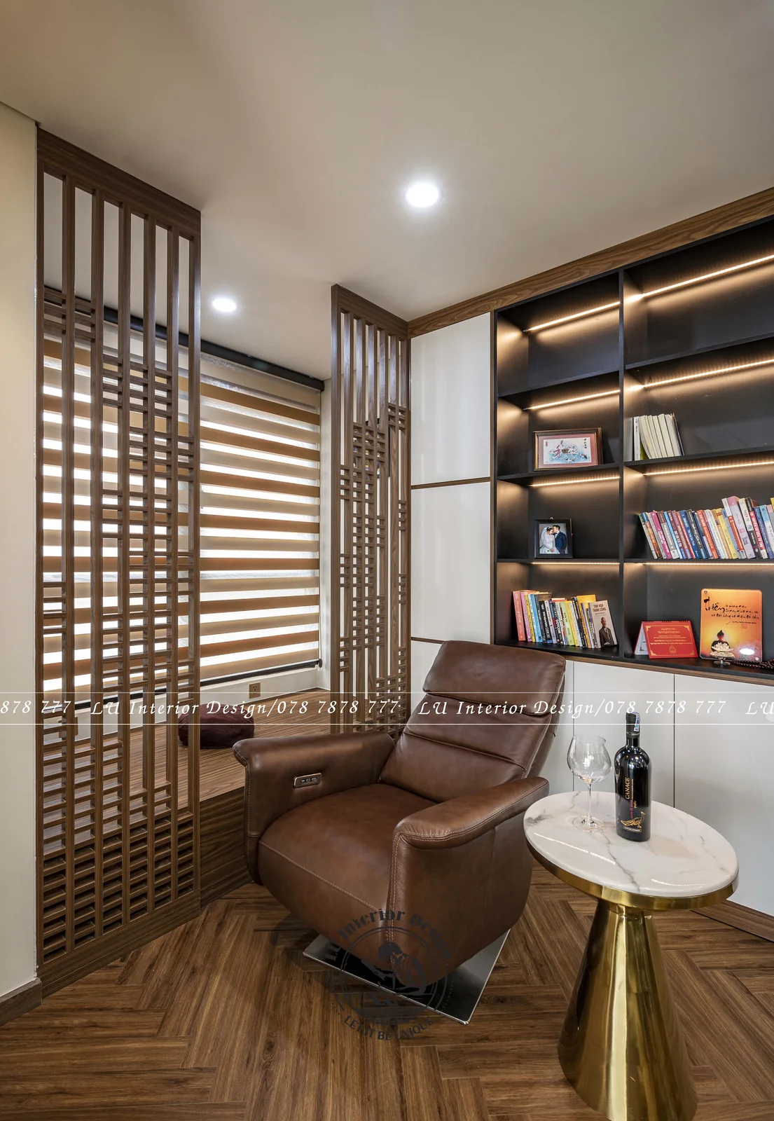 Ghế da đọc sách và vách nan gỗ – hình ảnh thực tế công trình căn hộ Duplex 3PN 148m² – LU Design