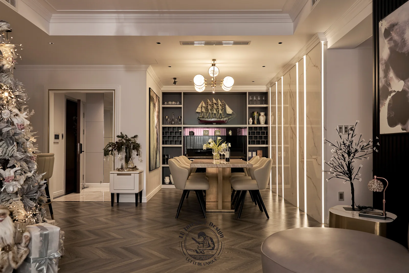 Tủ rượu gỗ đen và bàn ăn – hình ảnh thực tế công trình căn hộ sân vườn Riverpark Residence 123m² – LU Design