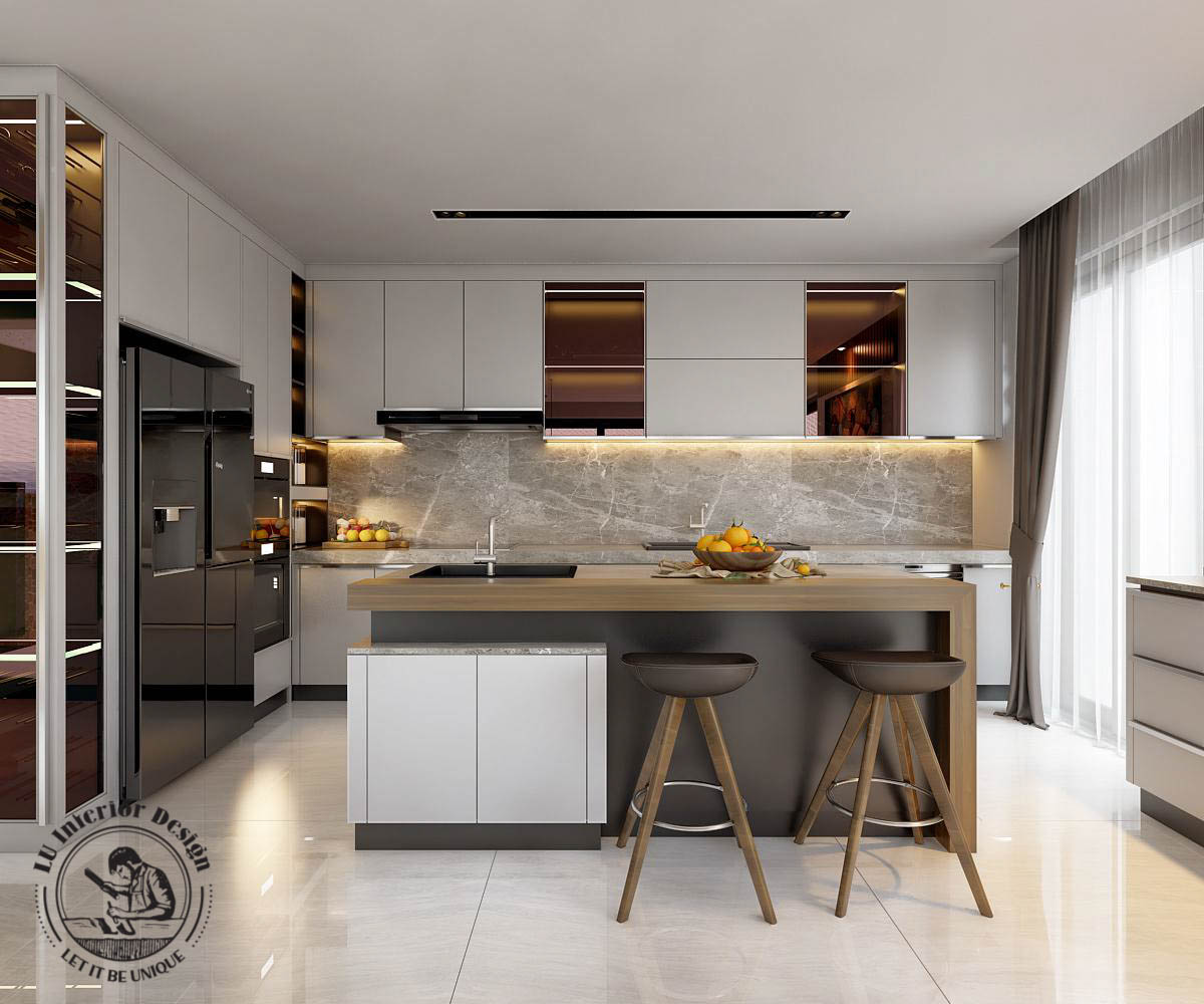 Lấy gam màu trắng - xám làm chủ đạo, nhấn nhá thêm sắc đồng gold trên hệ tủ bếp mang lại sự ấm cúng và sang trọng cho không gian bếp | Dự án Villa Vũng Tàu - LU Design thực hiện.